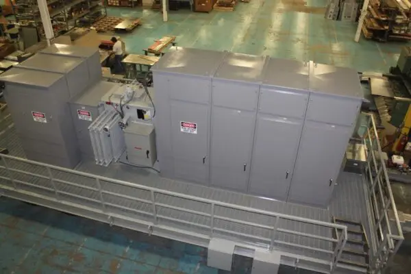 a large grey machine in a warehouse
