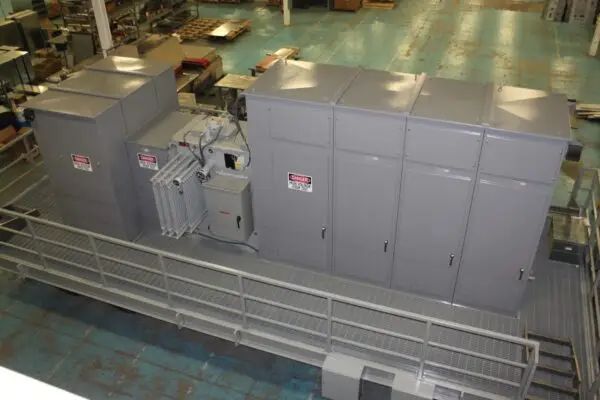 a large grey machine in a factory